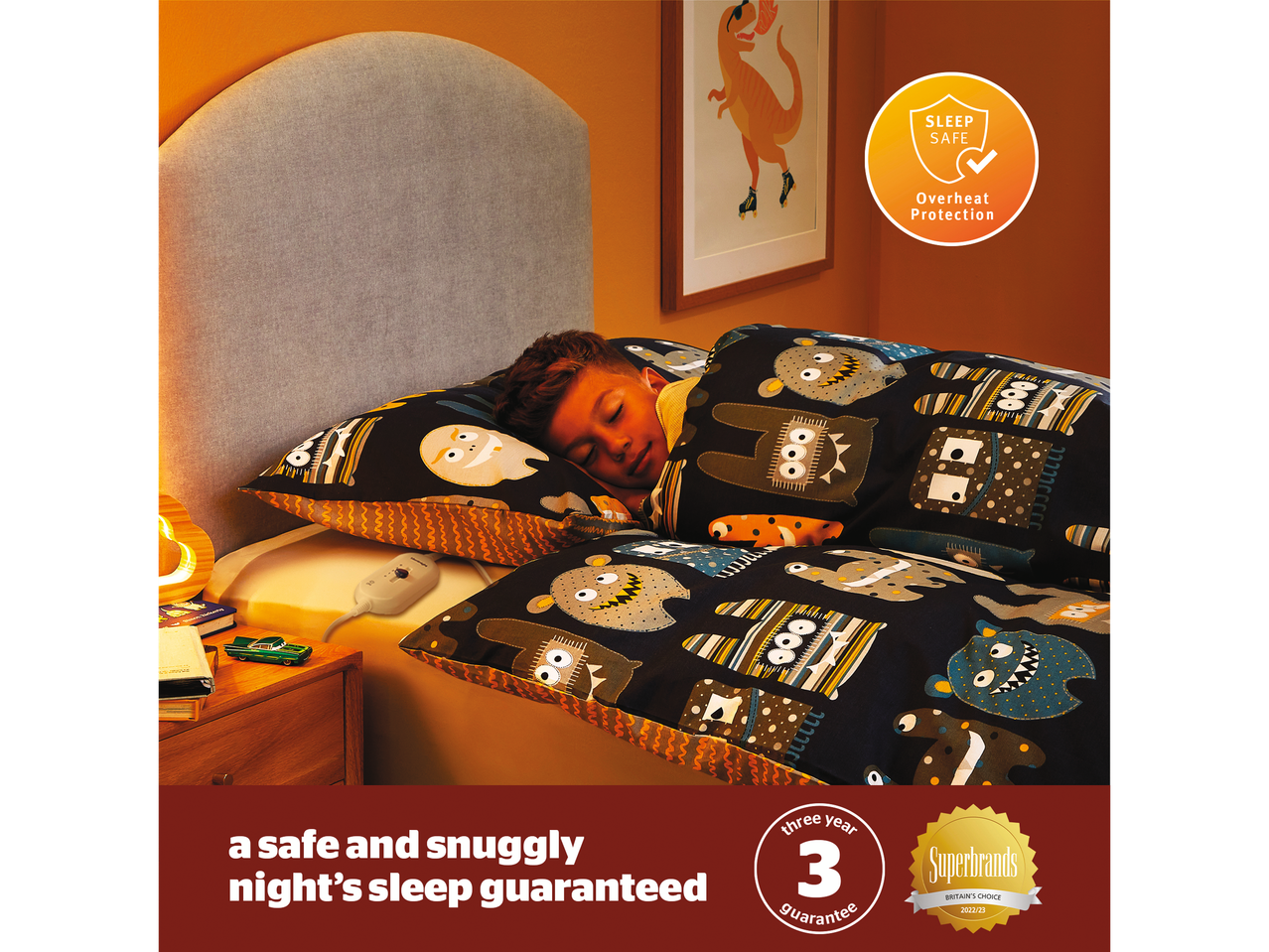 Child sleeps soundly under a Superbrands-awarded electric blanket with monster-themed bedding.