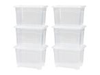 Two stacks of three clear plastic storage boxes with lids
