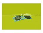 Blue sunglasses floating in yellow water with splashes.