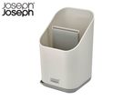 Joseph Joseph's off-white utensil holder with a gray base.