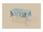 Light blue tablecloth with a floral pattern of pink and white roses and green leaves on a table.
