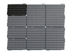 Modular storage system with black and gray pegboards, featuring various hooks and holes.