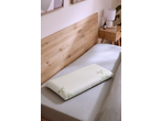 Livarno Premium Ergonomic Neck Support Pillow with bamboo design on a bed.