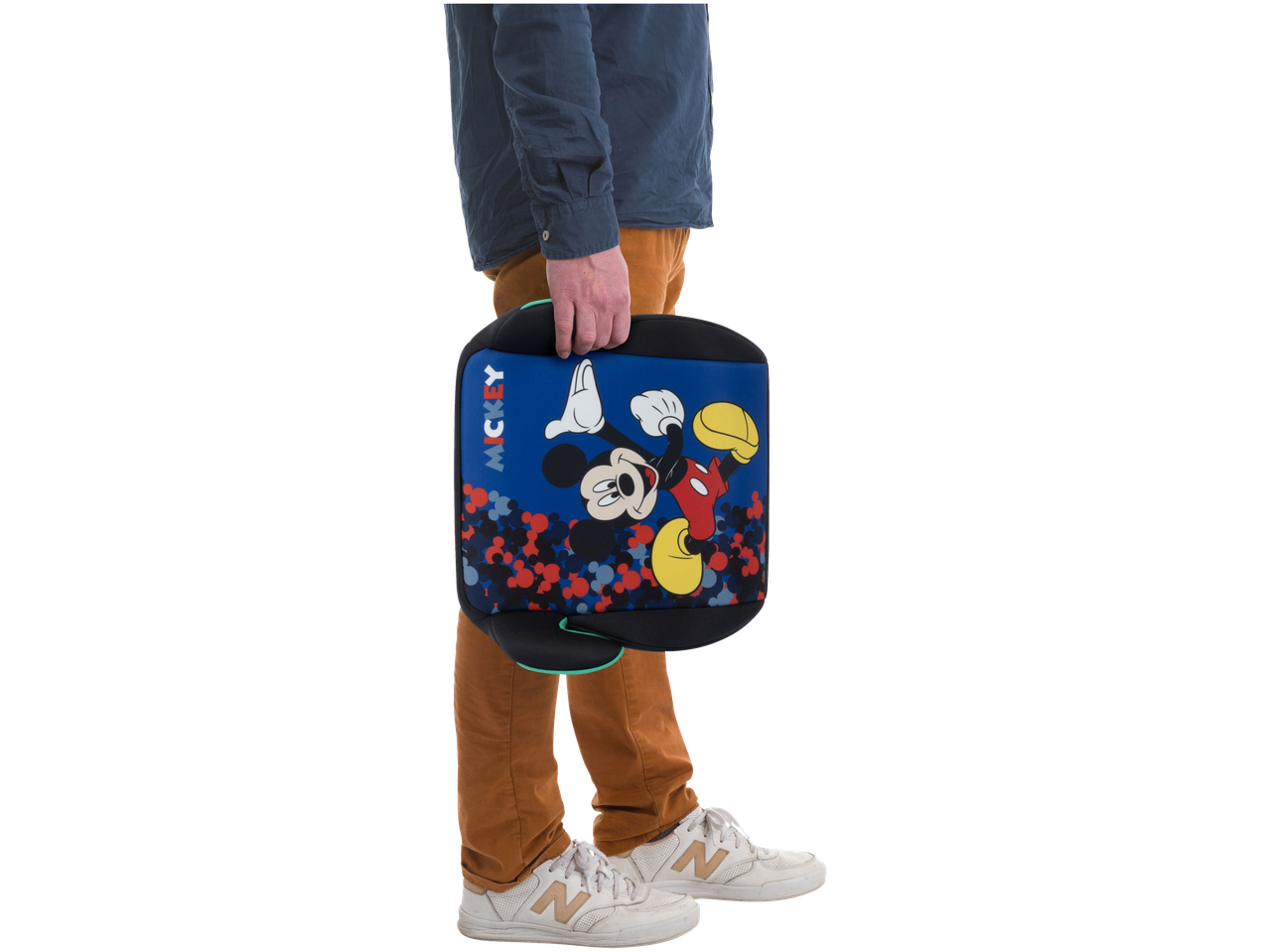 Bebeconfort Booster Seat with Mickey Mouse design, held by a person in brown pants.
