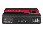 A black and red portable jump starter with multiple USB ports and an engine start button.