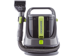 A Daewoo portable carpet cleaner with a detachable brush head.