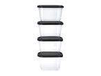 A stack of four clear rectangular food storage containers with black lids.