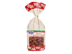 Bag of roasted and caramelised almonds with a rustic, floral design.
