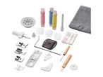 Sewing machine accessories including thread, bobbins, needles, and various presser feet.