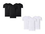 Sæt med sorte og hvide T-shirts med rund hals.