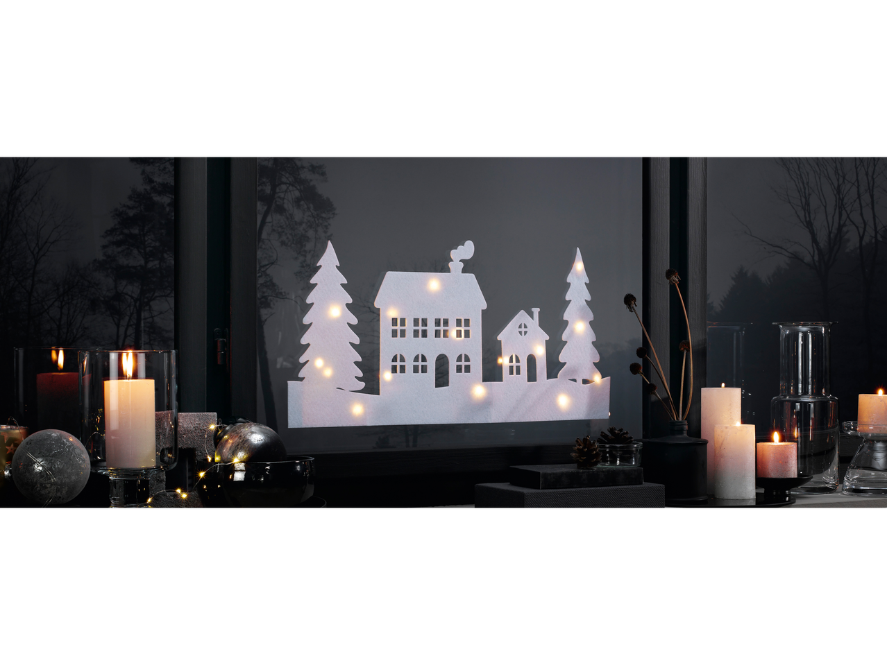 LIVARNO home LED Window Decoration with a winter village scene and candles