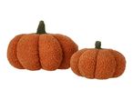 Two plush orange pumpkins with green stems, one large and one small.