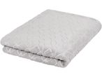 Light gray plush blanket with an embossed leaf pattern, folded neatly.
