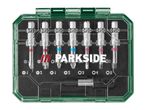 A set of screwdriver bits in a clear green case, with various sizes and types visible.