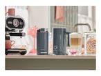 SilverCrest coffee machine, grinder, and milk frother on a kitchen counter.