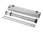 Disassembled portable aluminum table showing the tabletop and legs.