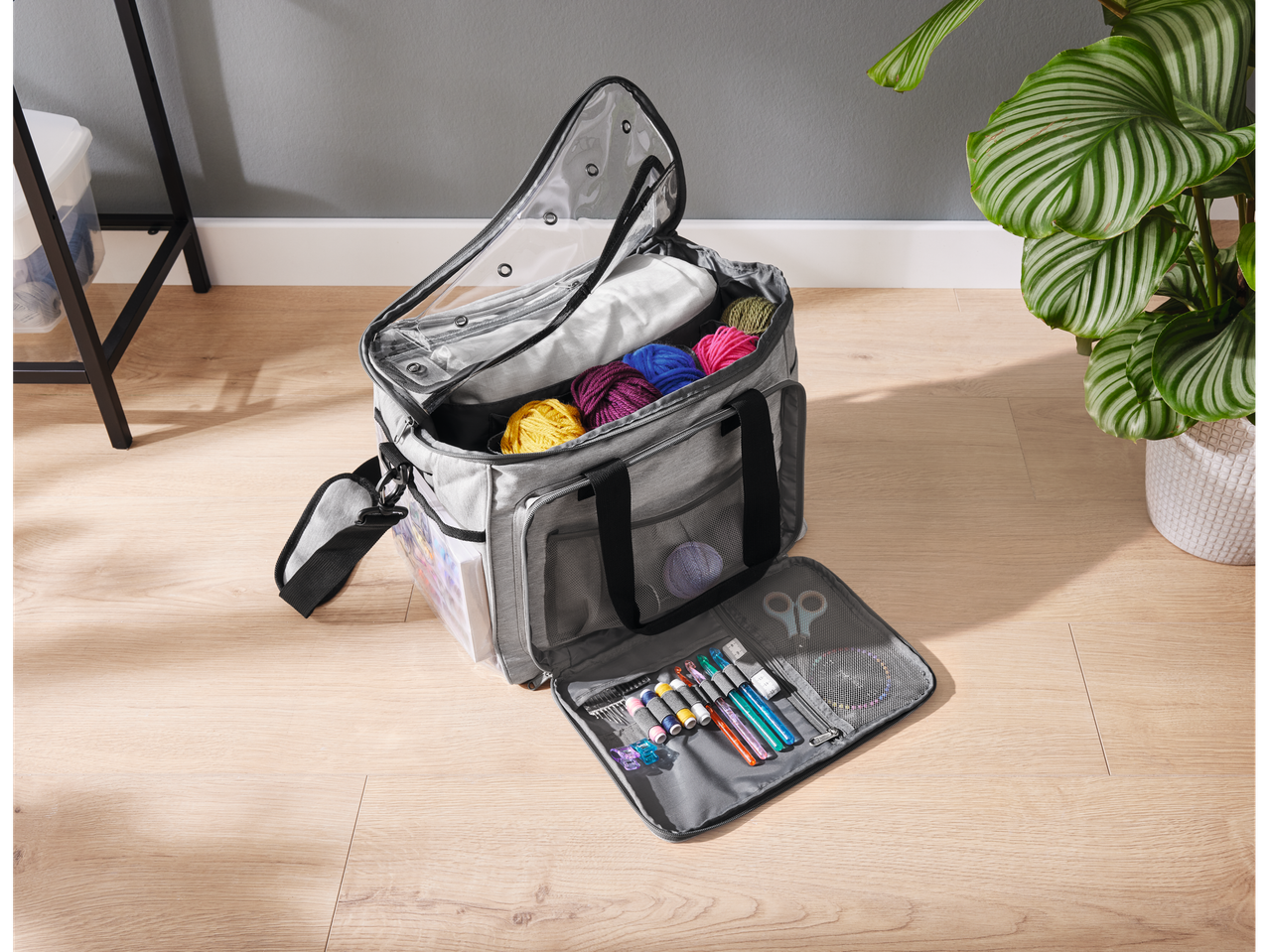 Knitting bag with yarn and accessories.