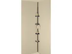 Black corner shower caddy with four shelves holding soap, lotion, and a loofah.