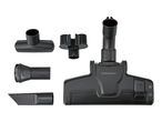 Vacuum cleaner nozzle set with floor head, crevice tool, upholstery brush, and accessory holder.