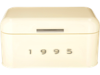A cream-colored SILVERCREST® bread bin with the year 1995 embossed on it.