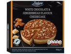 Deluxe White Chocolate & Gingerbread Flavour Cheesecake with biscuit and white chocolate curls.
