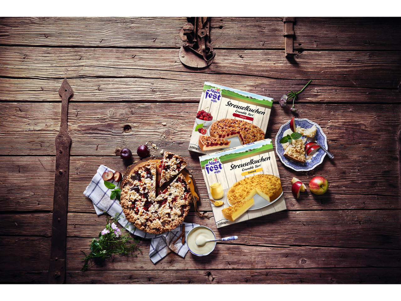 Alpenfest Streuselkuchen (Crumble Tart) products and a baked tart on a wooden surface.