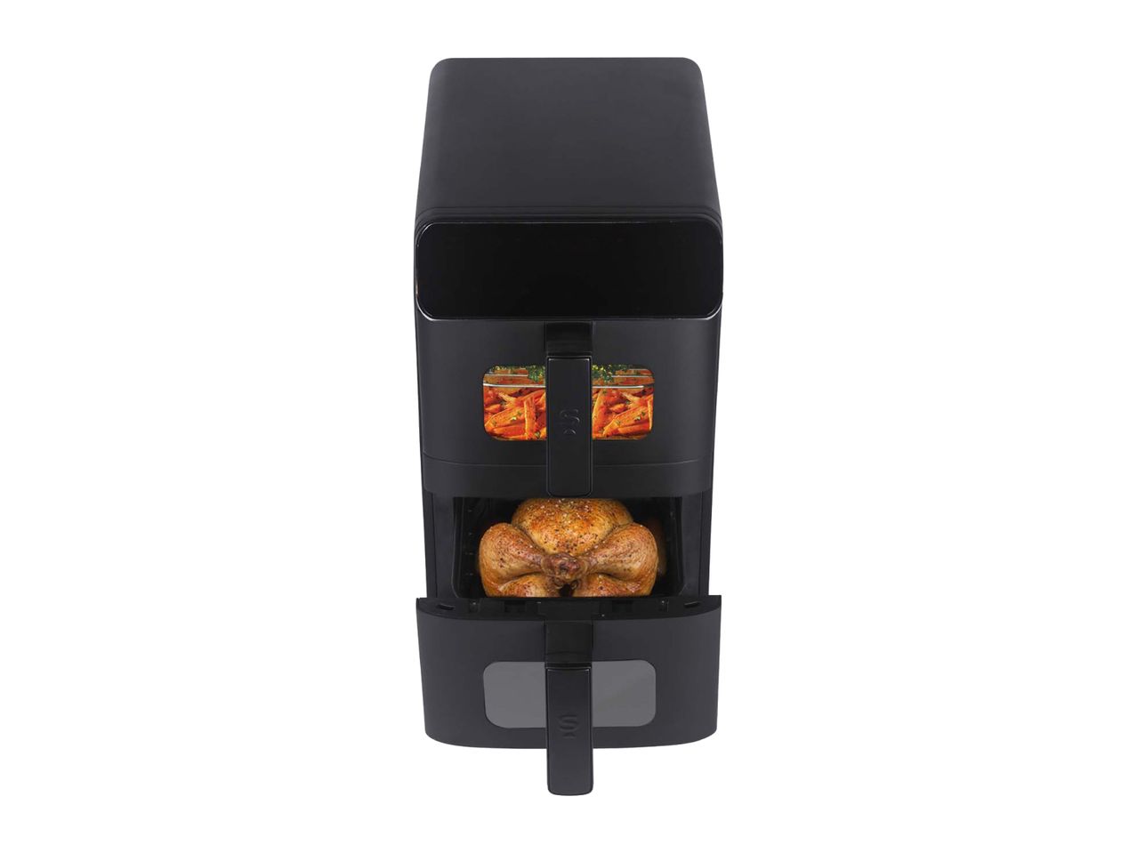 Black air fryer with a whole roasted chicken and carrots cooking inside.