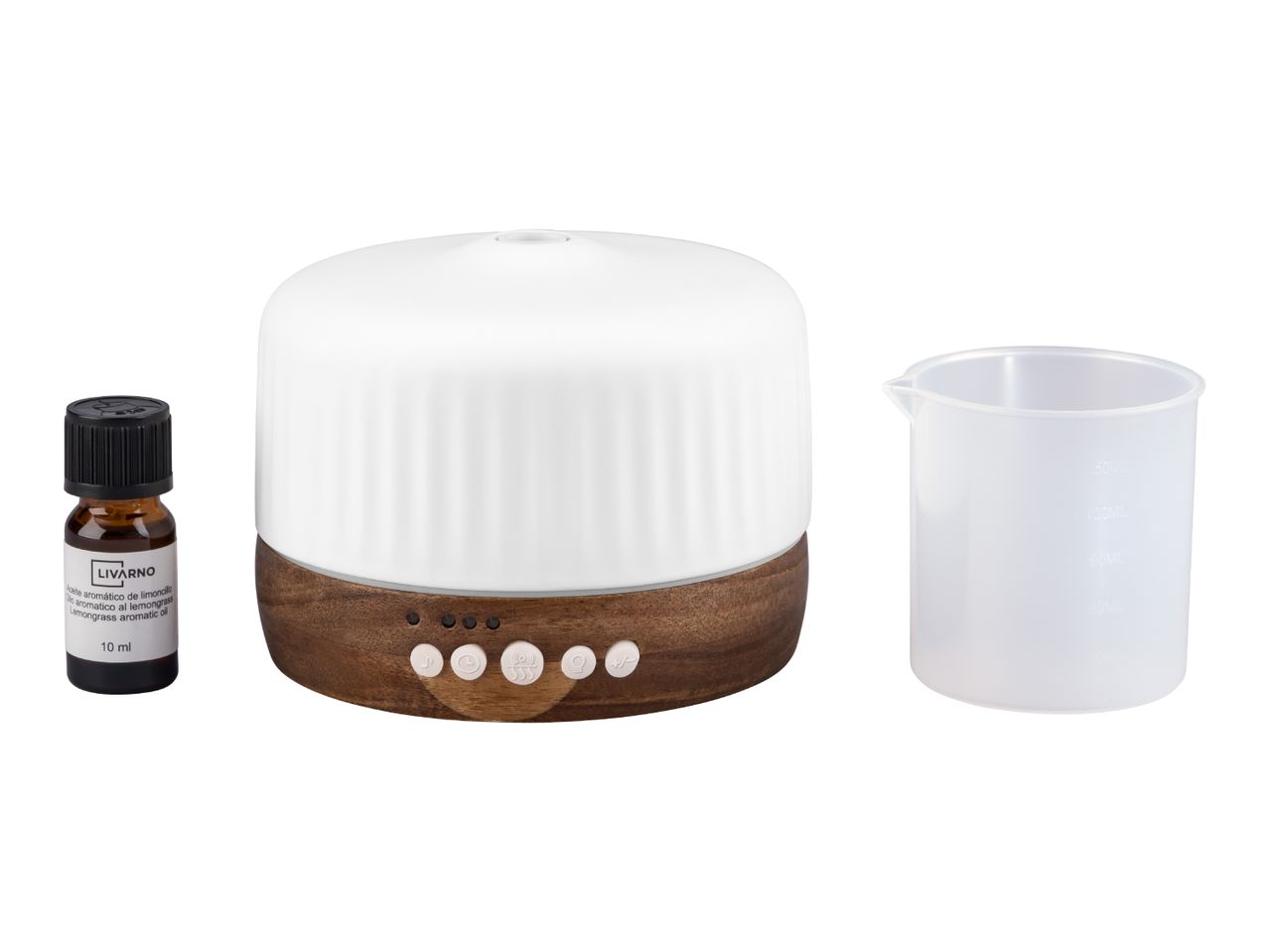 Aroma diffuser with a wood-look base, essential oil, and a measuring cup