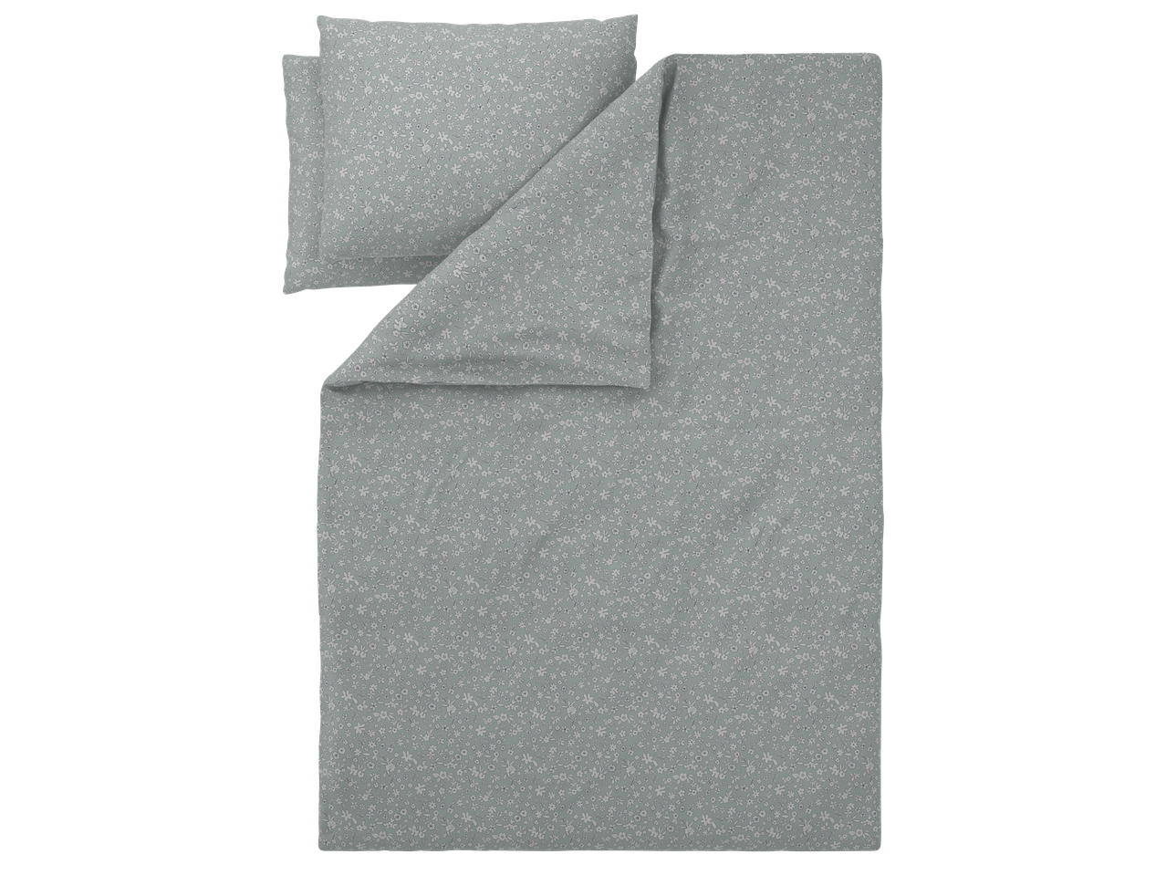 Комплект спално бельо със ситни бели цветя на светлозелен фон.