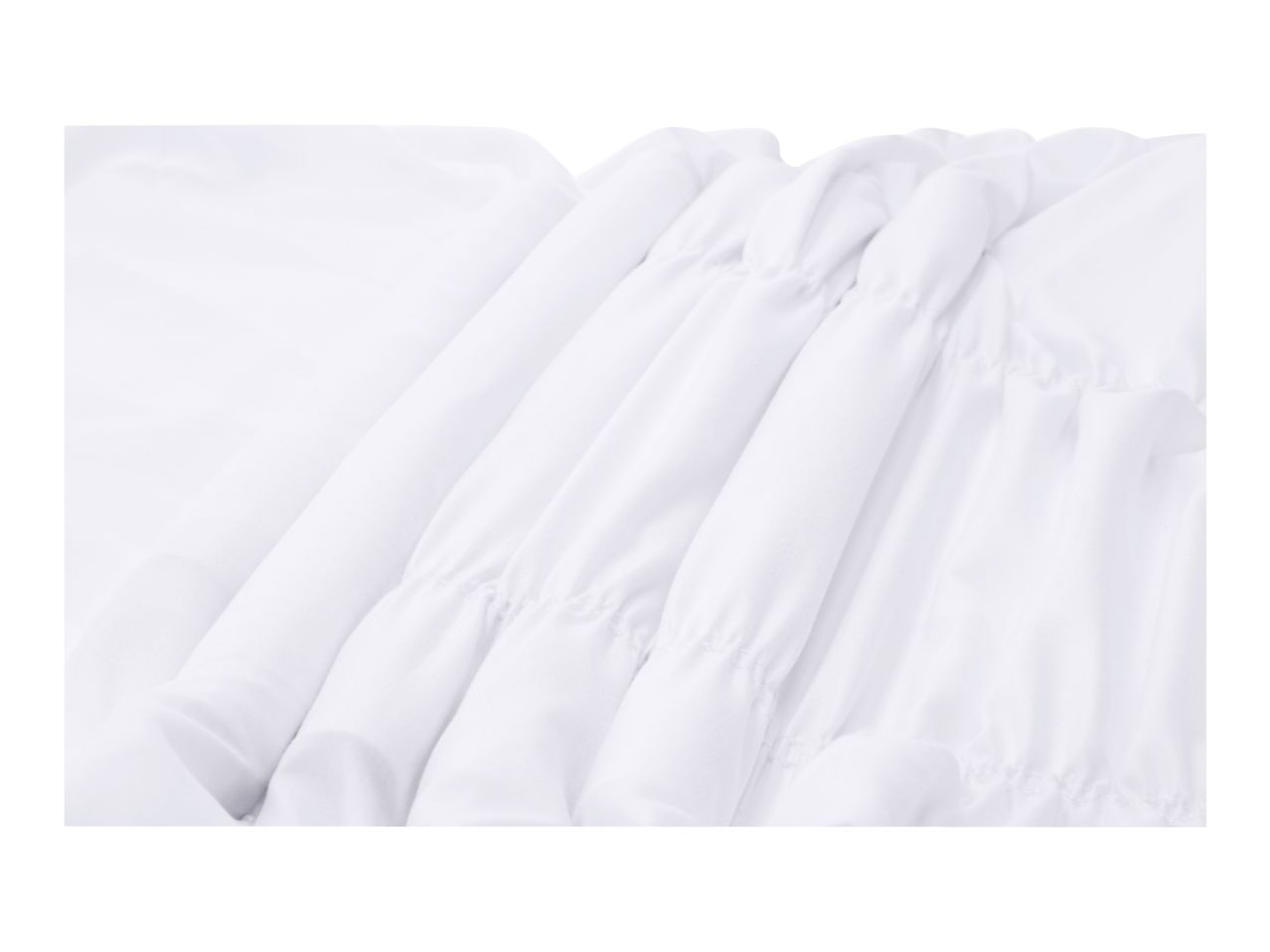 Close-up of white fabric with elasticated ruching detail