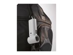 White portable speaker hanging from a black backpack.