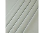 Close-up of light green fabric with diagonal folds