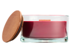 LIVARNO home Scented Candle: Red candle in a glass jar with a wooden lid.