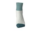 A single white and teal sock, standing upright on a white background.