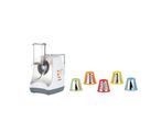 A white food processor with colorful attachments for slicing and dicing.