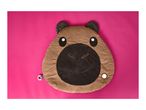 Capybara-shaped baby play mat with a rattle and a mirror on a pink background.