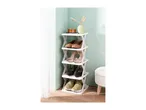 A white shoe rack with various shoes, a vase, and a decorative box.