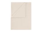 Beige fleece blanket folded at the corner