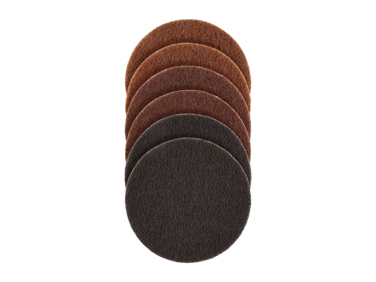Stack of round brown and black abrasive sanding discs