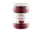 Jar of cooked grated beetroot with a colorful folk art label.