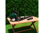Parkside leaf blower on a wooden table, with a hedge in the background.