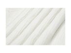 Close-up of white, textured muslin fabric with soft folds.