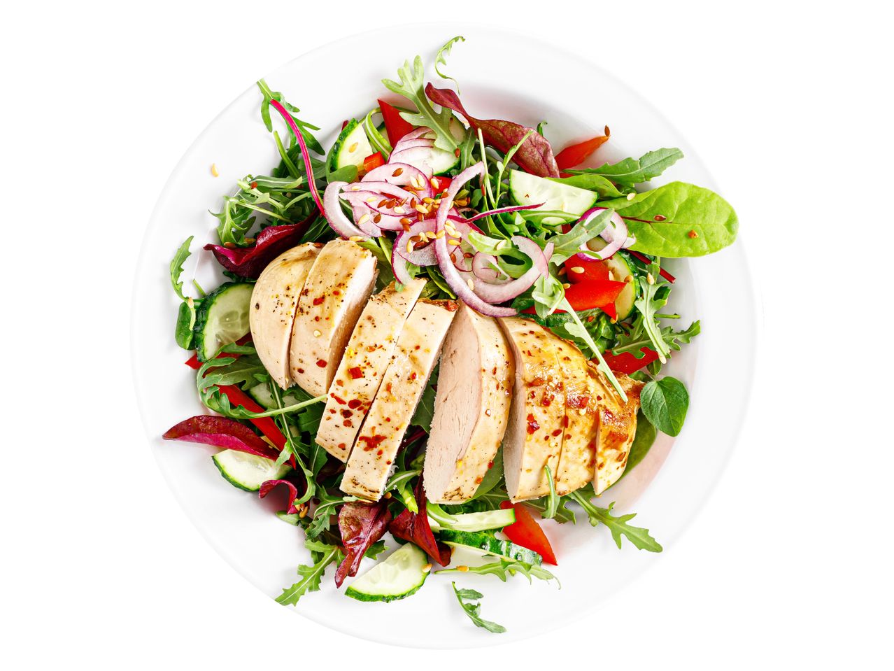 Grilled chicken breast salad with mixed greens and vegetables.