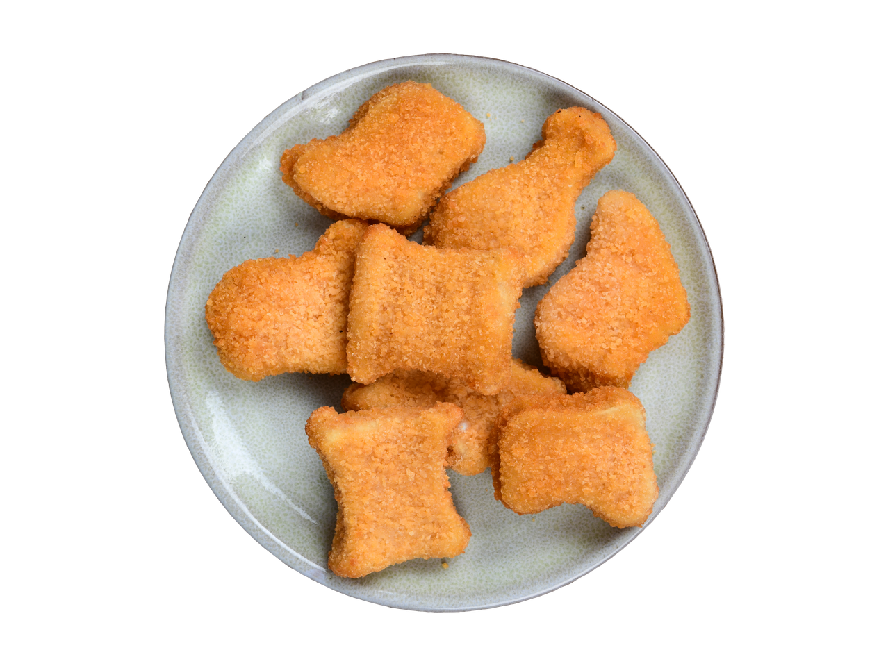Um prato de nuggets de frango dourados em várias formas.