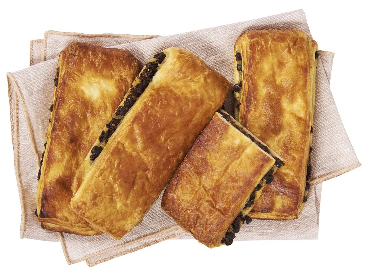 Pâtisseries au chocolat sur une serviette en lin.