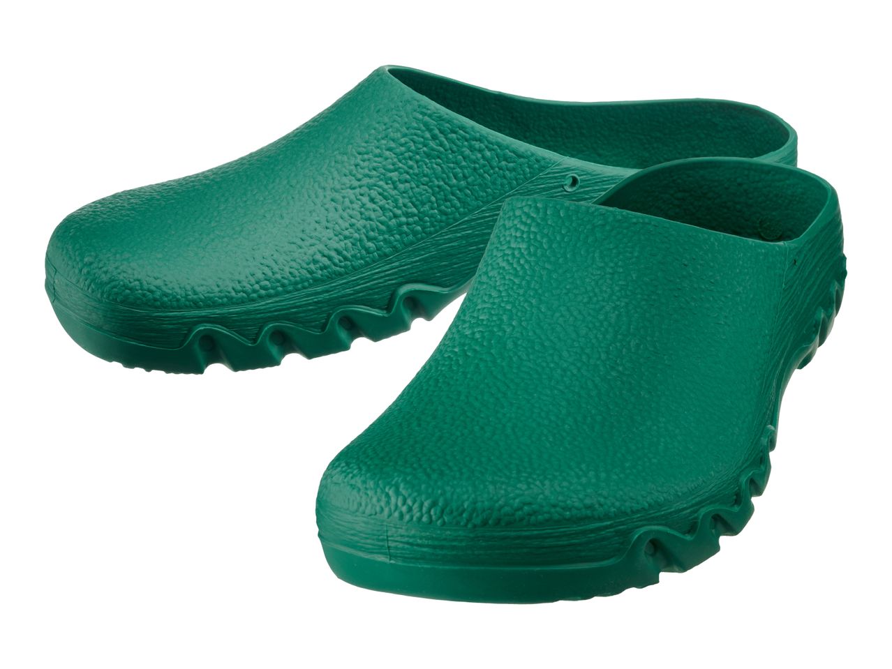 Pair of green medical clogs with textured surface and wavy soles