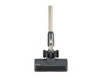 Close-up of a grey and gold cordless vacuum cleaner head