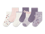 Sechs Paar Kindersocken in verschiedenen Farben und Mustern, darunter Blumen und Streifen.