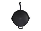 Black cast iron skillet with a long handle and two small side handles, viewed from above.