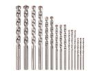 A set of various sized masonry drill bits, arranged from largest to smallest.